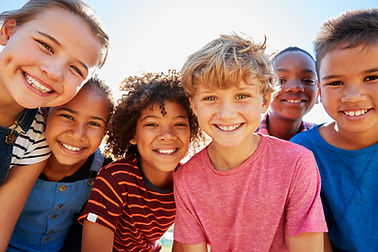 Close up of pre-teen friends in a park s