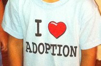 Child wearing a I heart adoption t-shirt