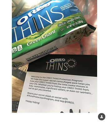 Oreo Thins pack disguised as Green Giant Riced Veggies, with promo note on Oreo Thins Protection Program, inviting social media shares.