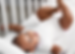 Picture of baby laying on its back