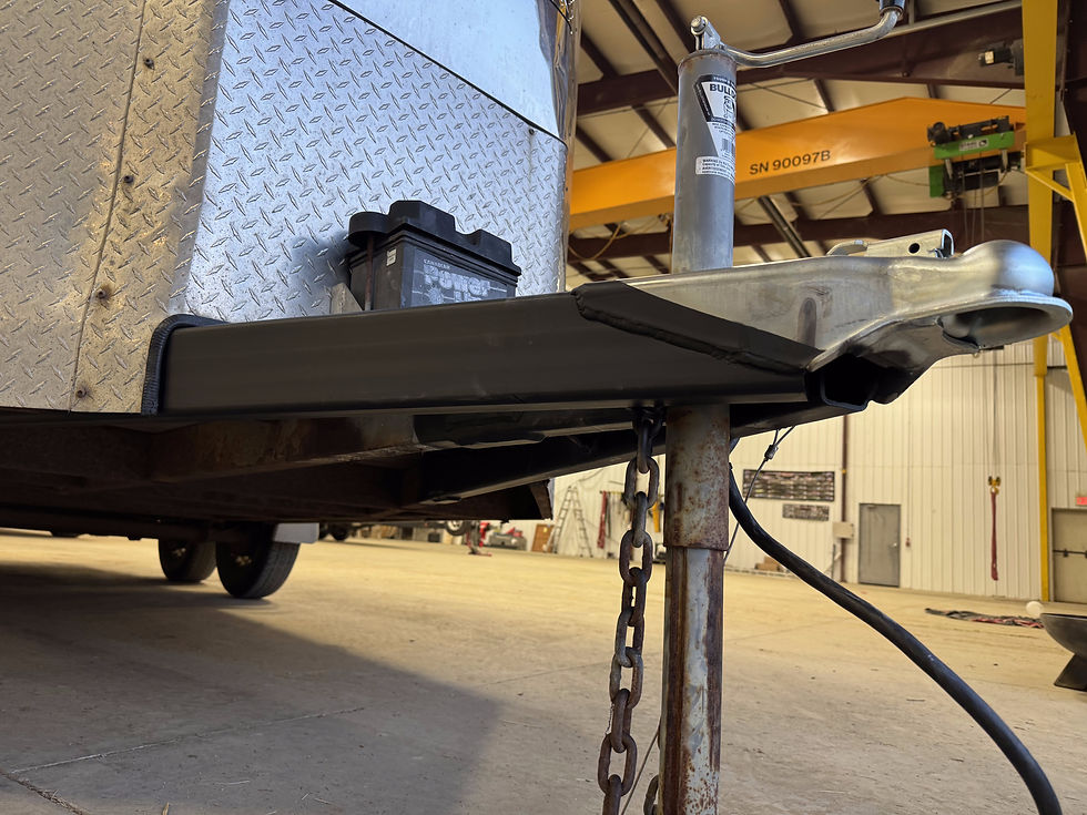 A custom-fabricated trailer tongue repair restored the damaged front section and returned the trailer to service.