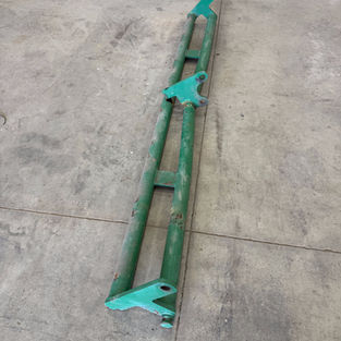 Golf course aerator attachment showing wear and fatigue before repair