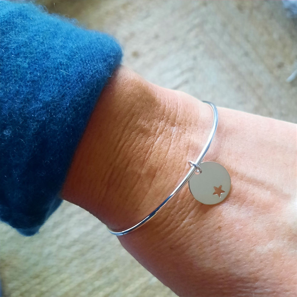 Miniature : Bracelet jonc en argent et médaille étoile évidée