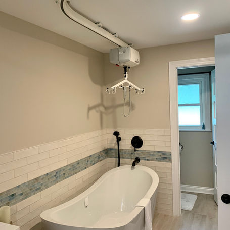 Tub with a track lift