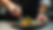 Close-up view of a chef plating a gourmet dish with precision