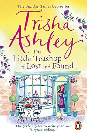 A colorful book cover shows a woman with red hair outside a teashop. The text reads "The Little Teashop of Lost and Found" by Trisha Ashley.