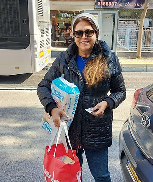 Orit delivering supplies