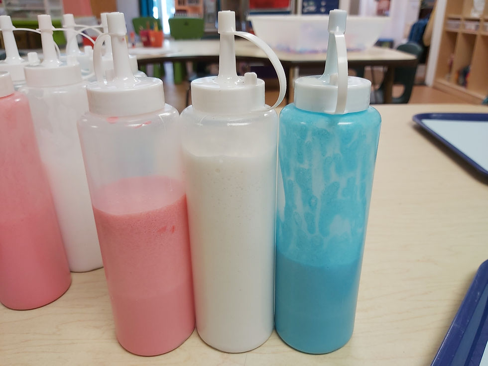 red, white and blue puffy paint in squeeze bottles