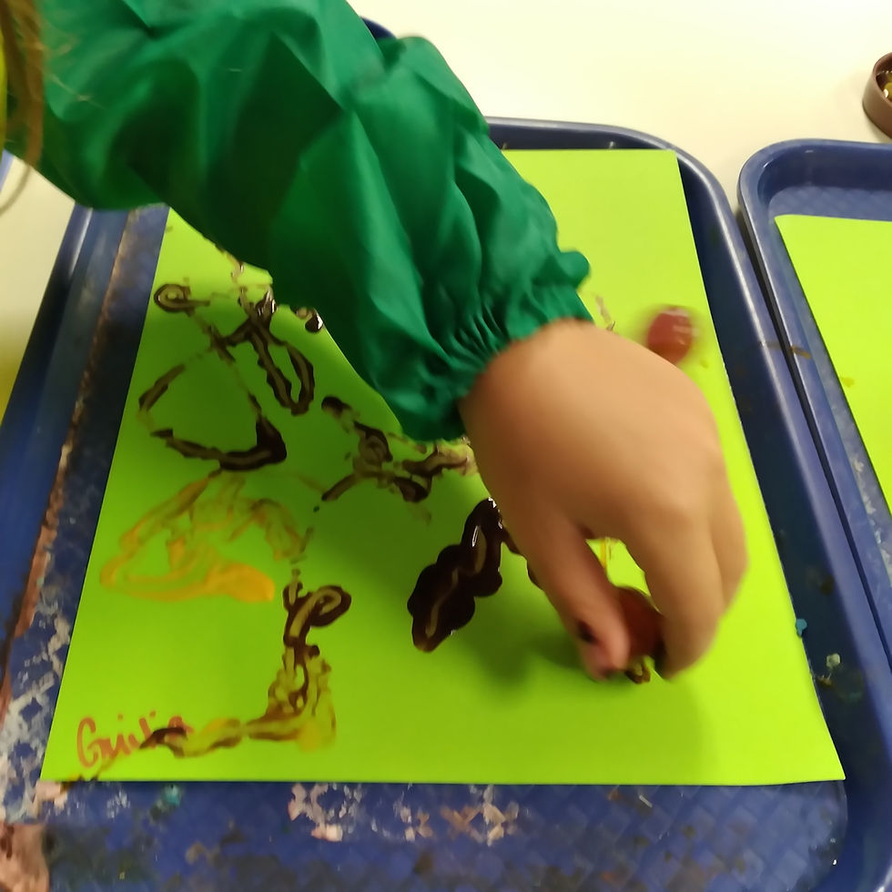 preschooler making avocado pit art