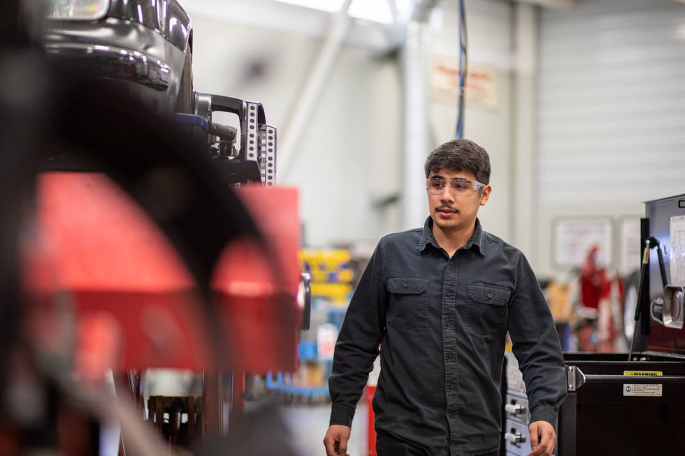 Auto student walks through the lab
