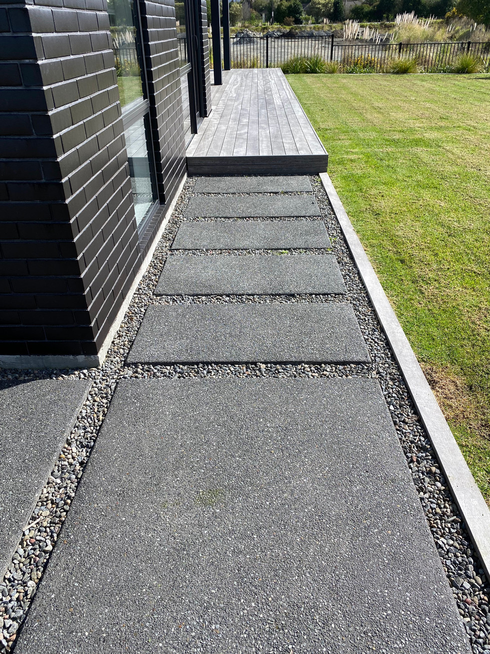 Exposed aggregate, with 5kg black oxide. Pavers. 