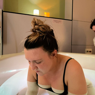 Woman looks calm in birthing pool