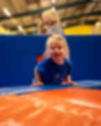 Toddler-friendly soft play frame with slides and tunnels at Rugrats & Halfpints Cirencester