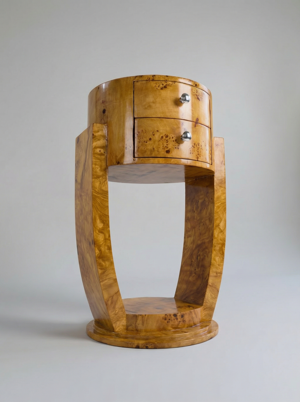 Guillemets Drawer in olive burl wood handcrafted in Italy with sculptural front detail