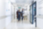 blurred-motion-of-diverse-doctors-and-medical-staf-2025-04-04-11-04-19-utc.jpg