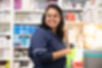 Friendly pharmacy team assisting customer in Thame
