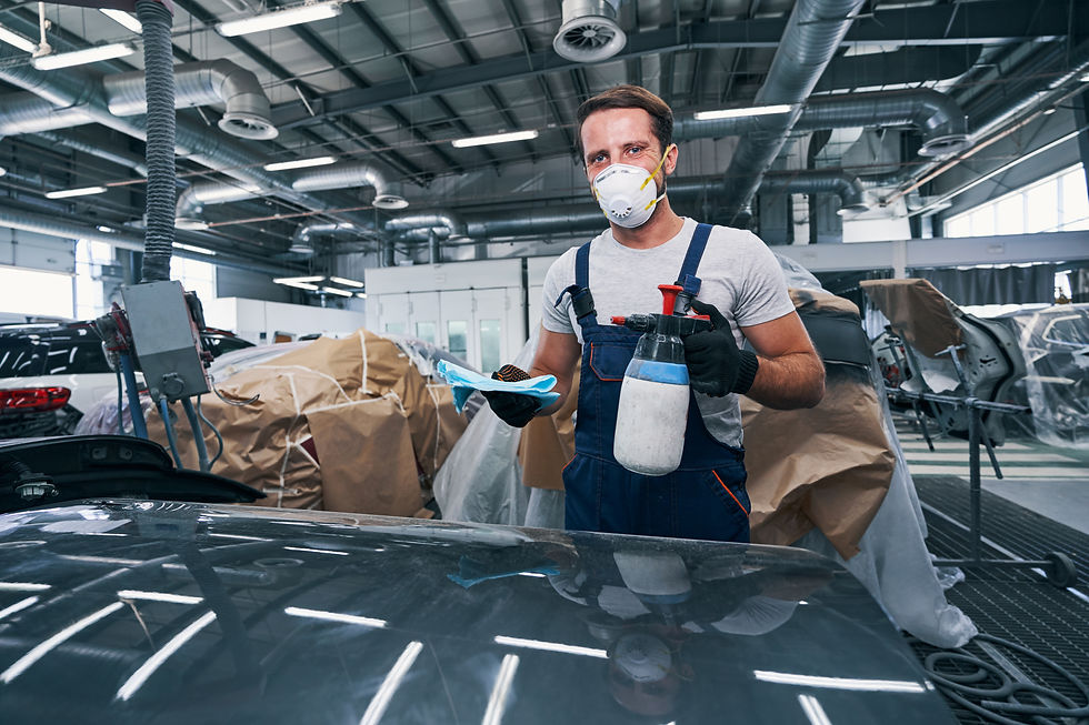 worker-of-auto-repair-garage-preparing-to-clean-ca-2023-11-27-05-21-26-utc (1).jpg