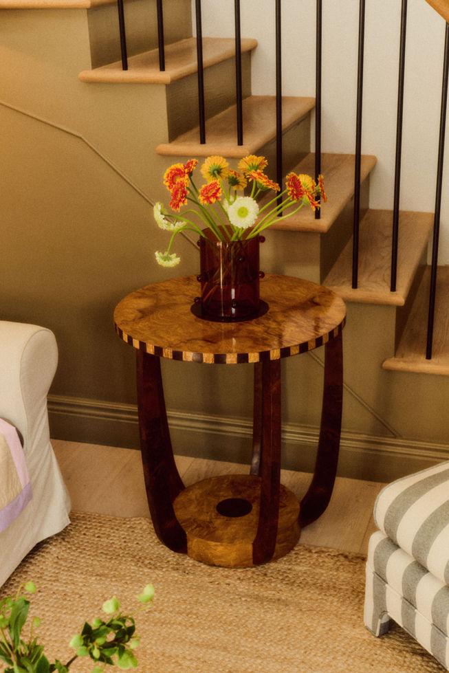 Roman olive burl side table styled in contemporary interior, handmade Italian furniture