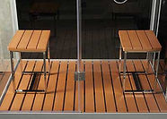 Composite wooden look floor and benches.