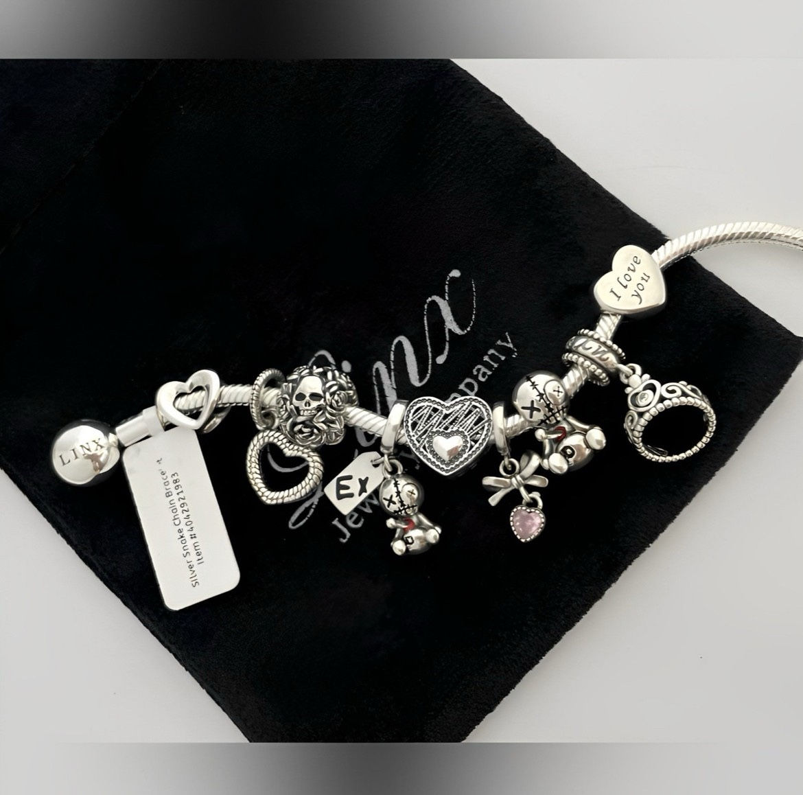 Linx Snake Chain Bracelet with Skull Voodoo Doll and Heart Themed Charms