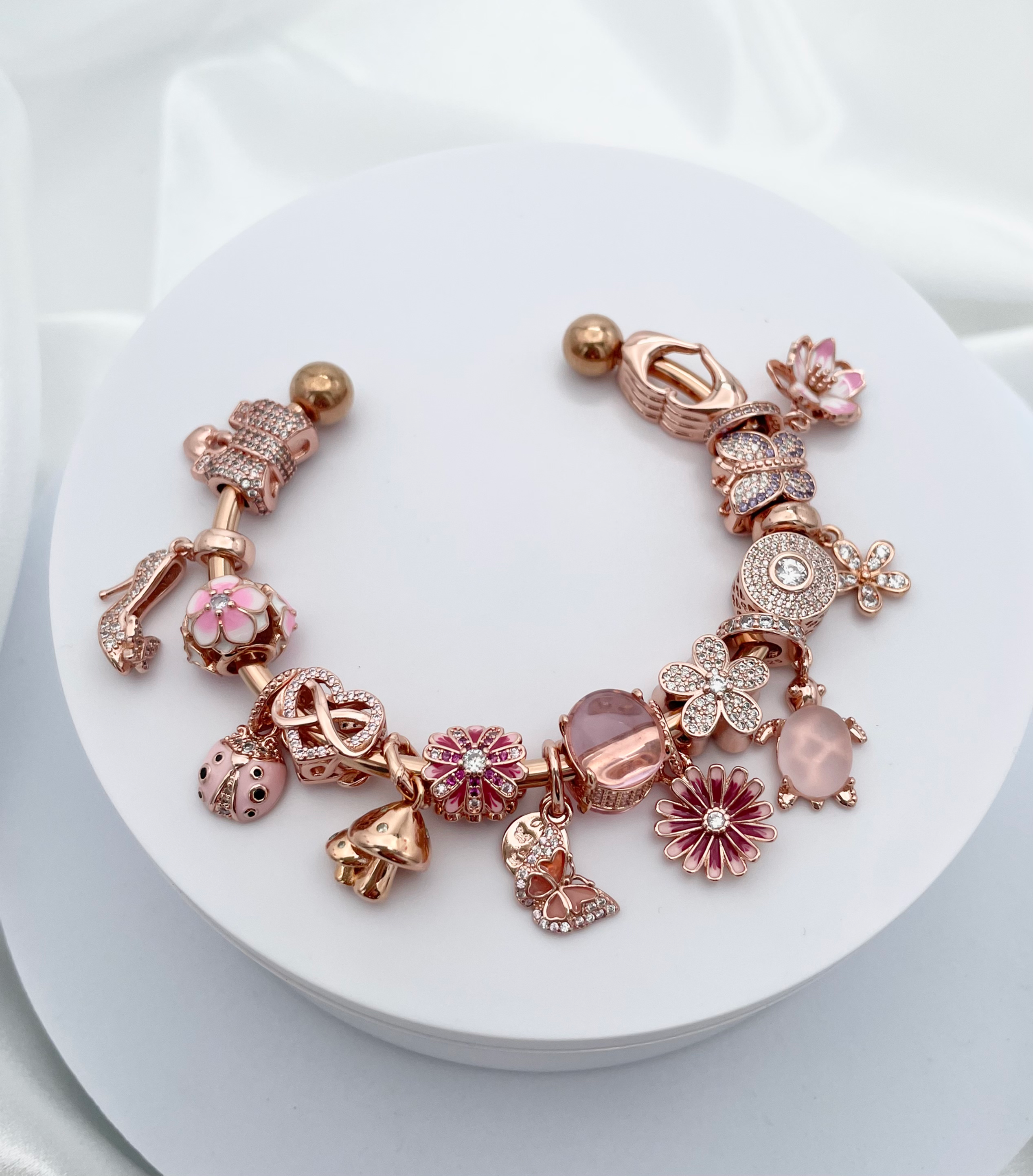 Linx Rose Gold Open Bangle with Rose Gold and Pink Zircon Themed Charms