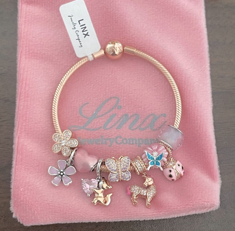 Thumbnail: Linx Rose Gold Snake Chain Bracelet with Rose Gold and Pink Themed Charms