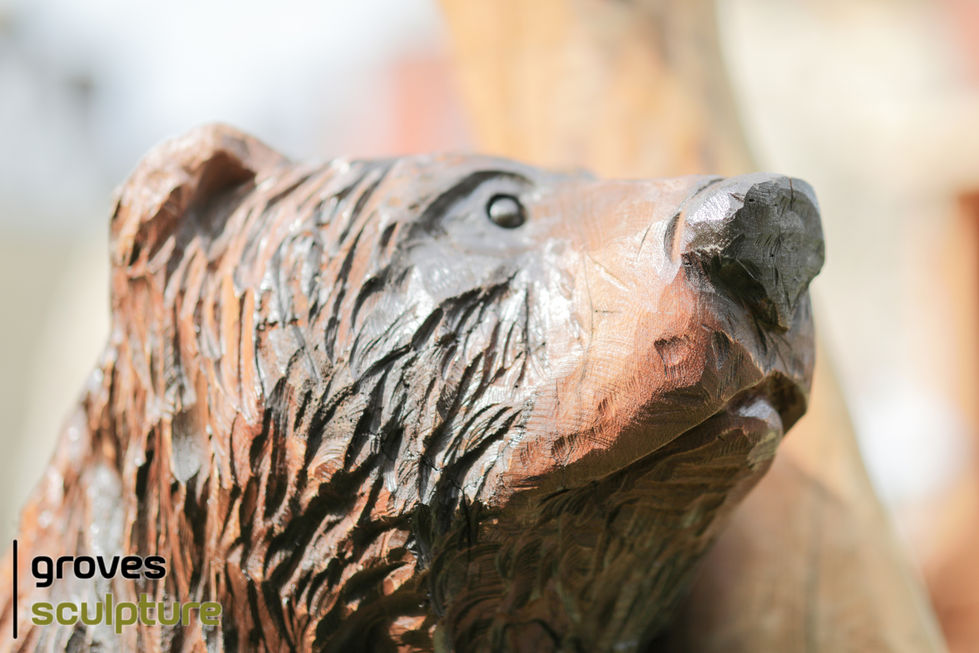 Close up of carved Bear sculpture.