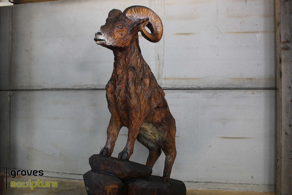 Large carved ibex sculpture