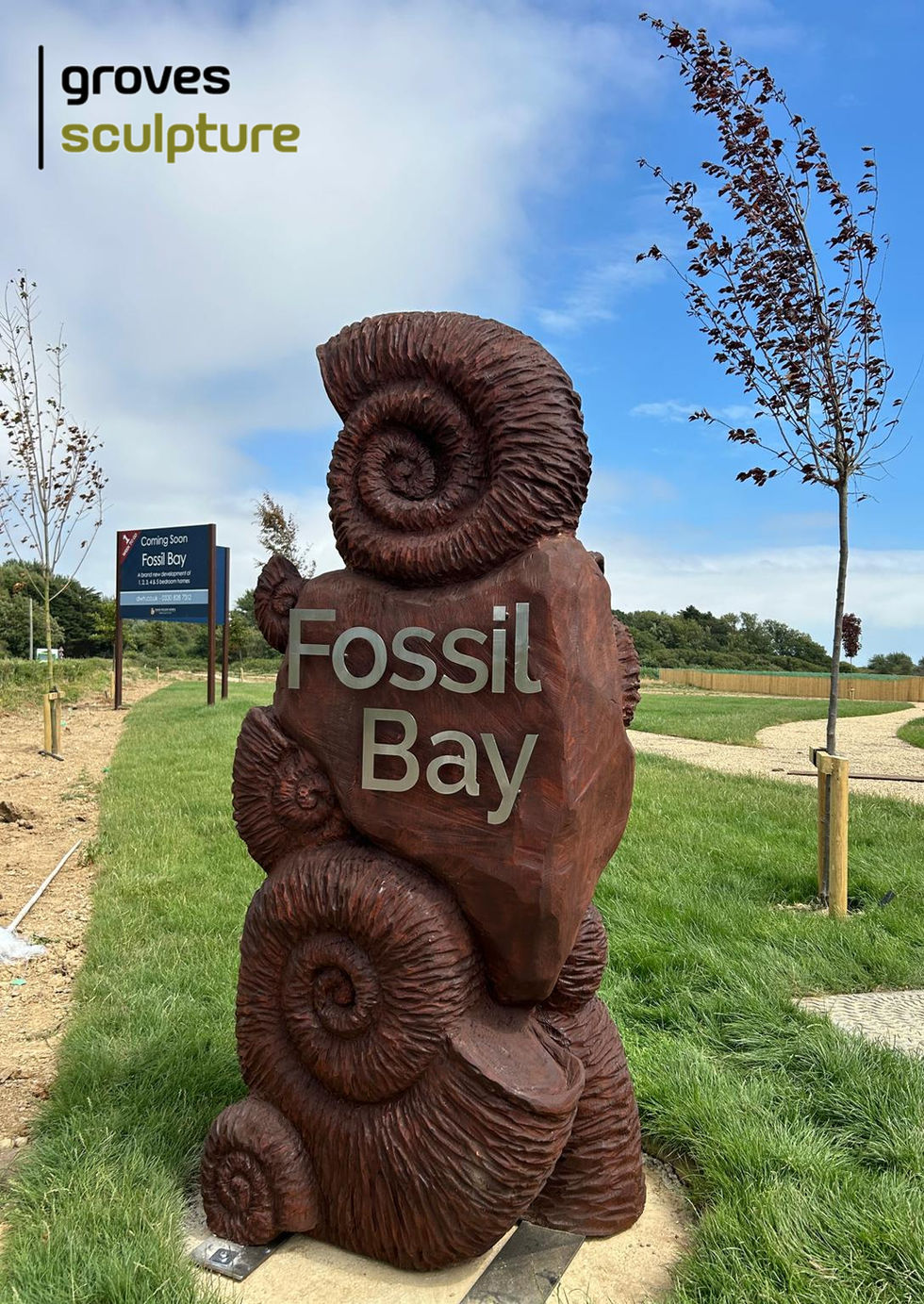 Photograph of carved ammonites sculpture insitu.