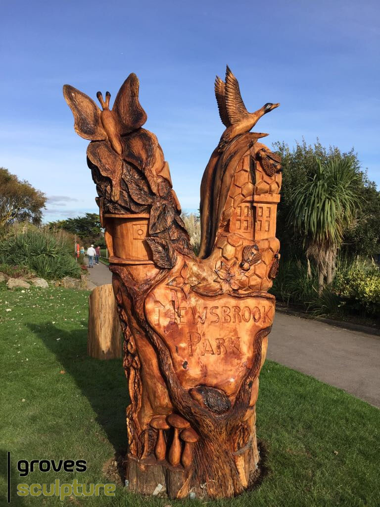 Photograph of carved wildlife and location sculpture.