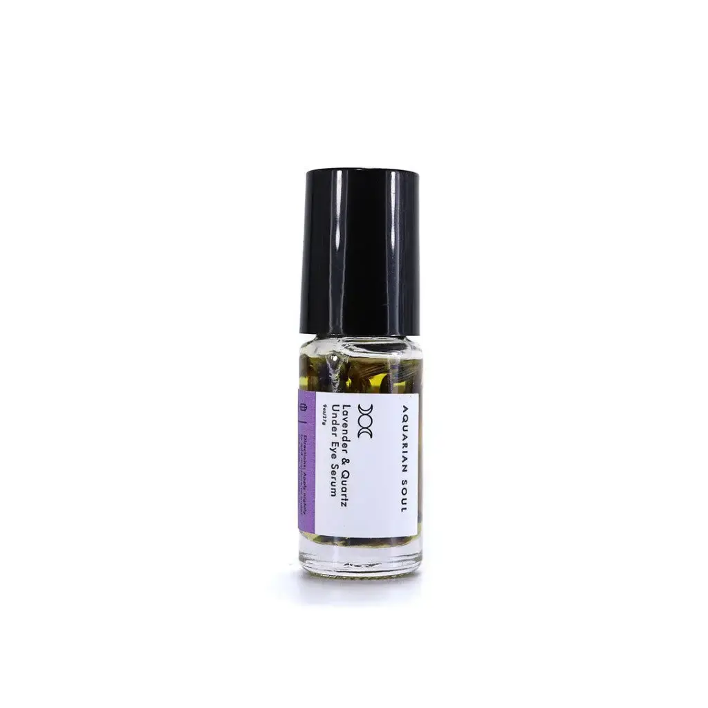 Crystal-infused Lavender Clear Quartz under eye serum displayed alone on a bright white background