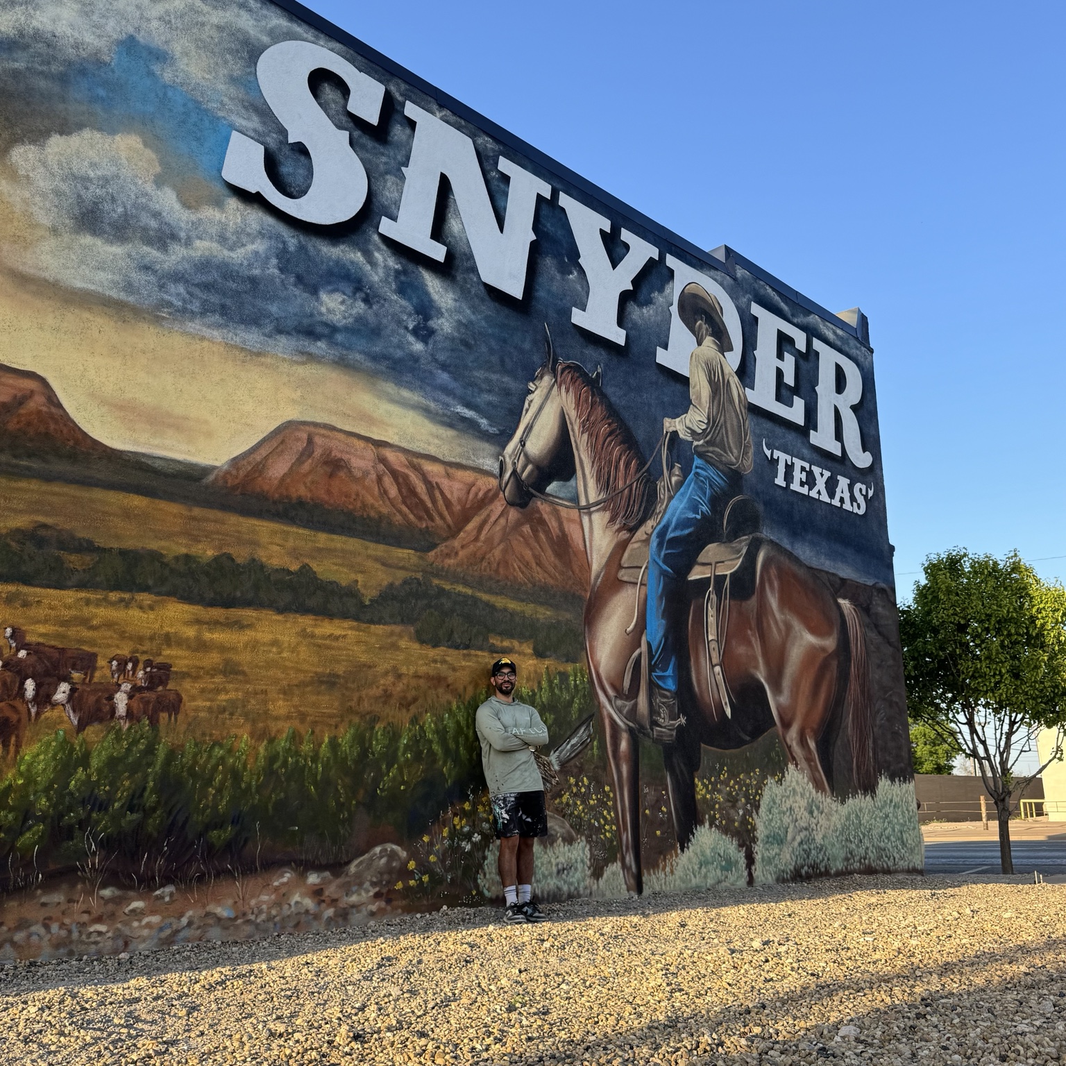 Monumental Snyder Texas Western heritage mural depicting a cowboy on horseback against an open landscape