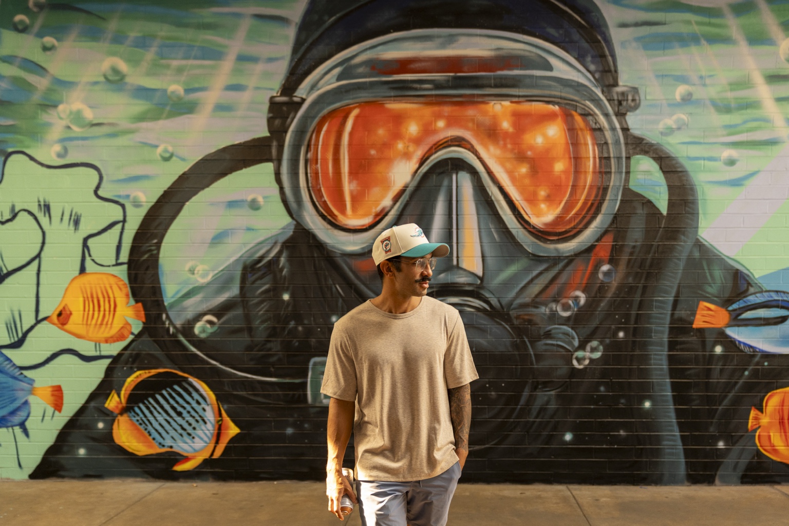 Diver and tropical fish mural in the ocean-themed Cordova Mall pedestrian tunnel