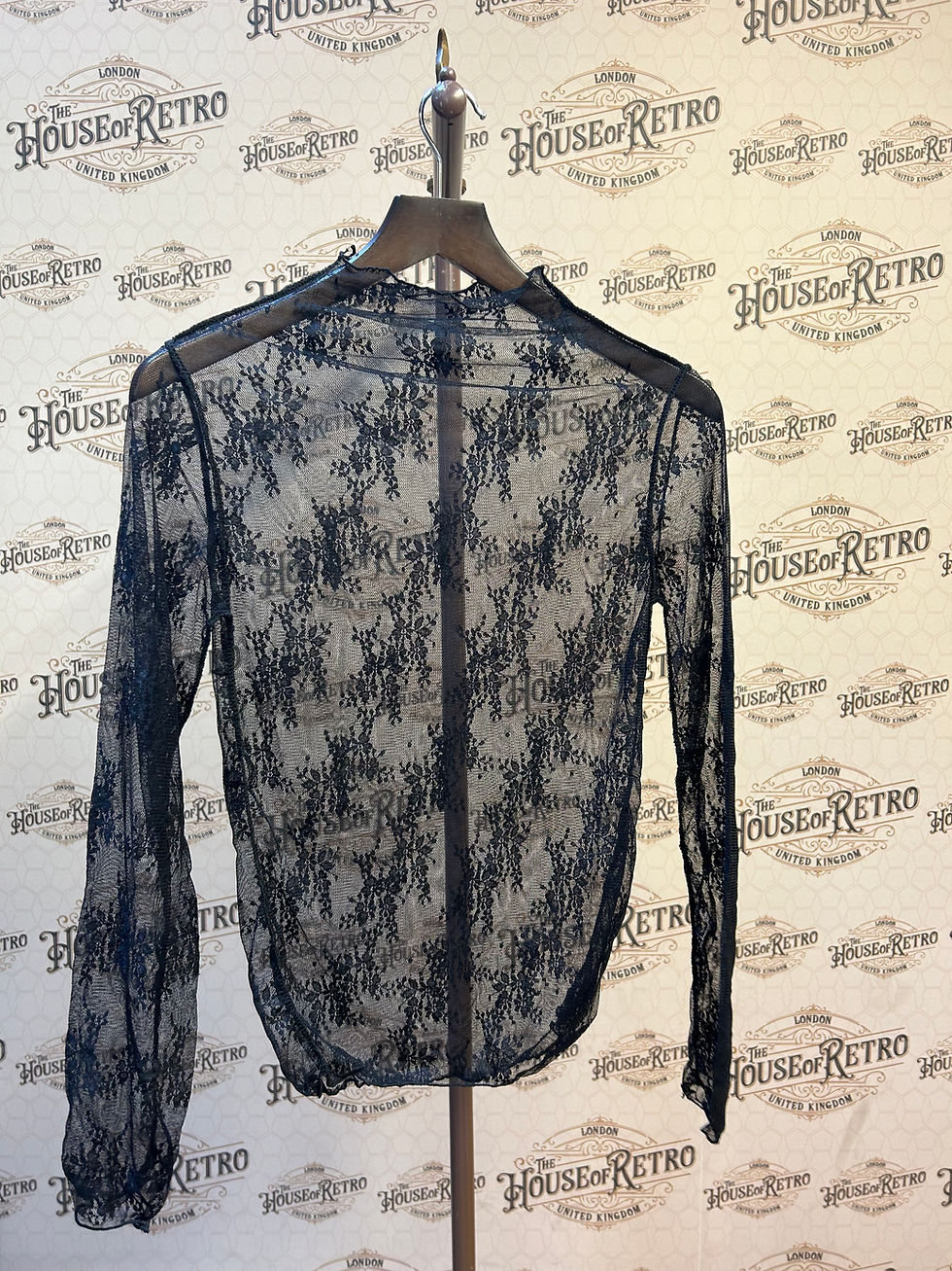 Thumbnail: black mesh top with floral print