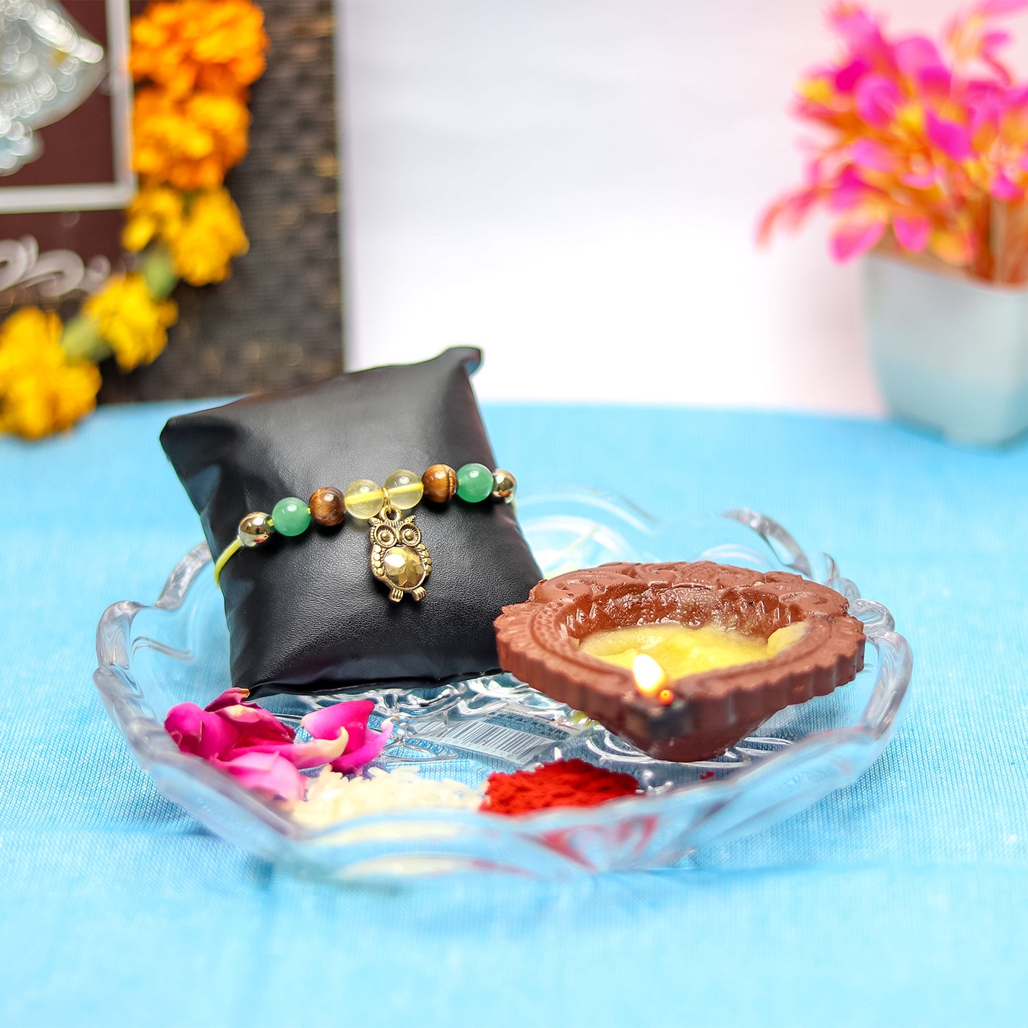 Money Magnet Crystal Rakhi with Owl Charm Attract Wealth, and Prosperity