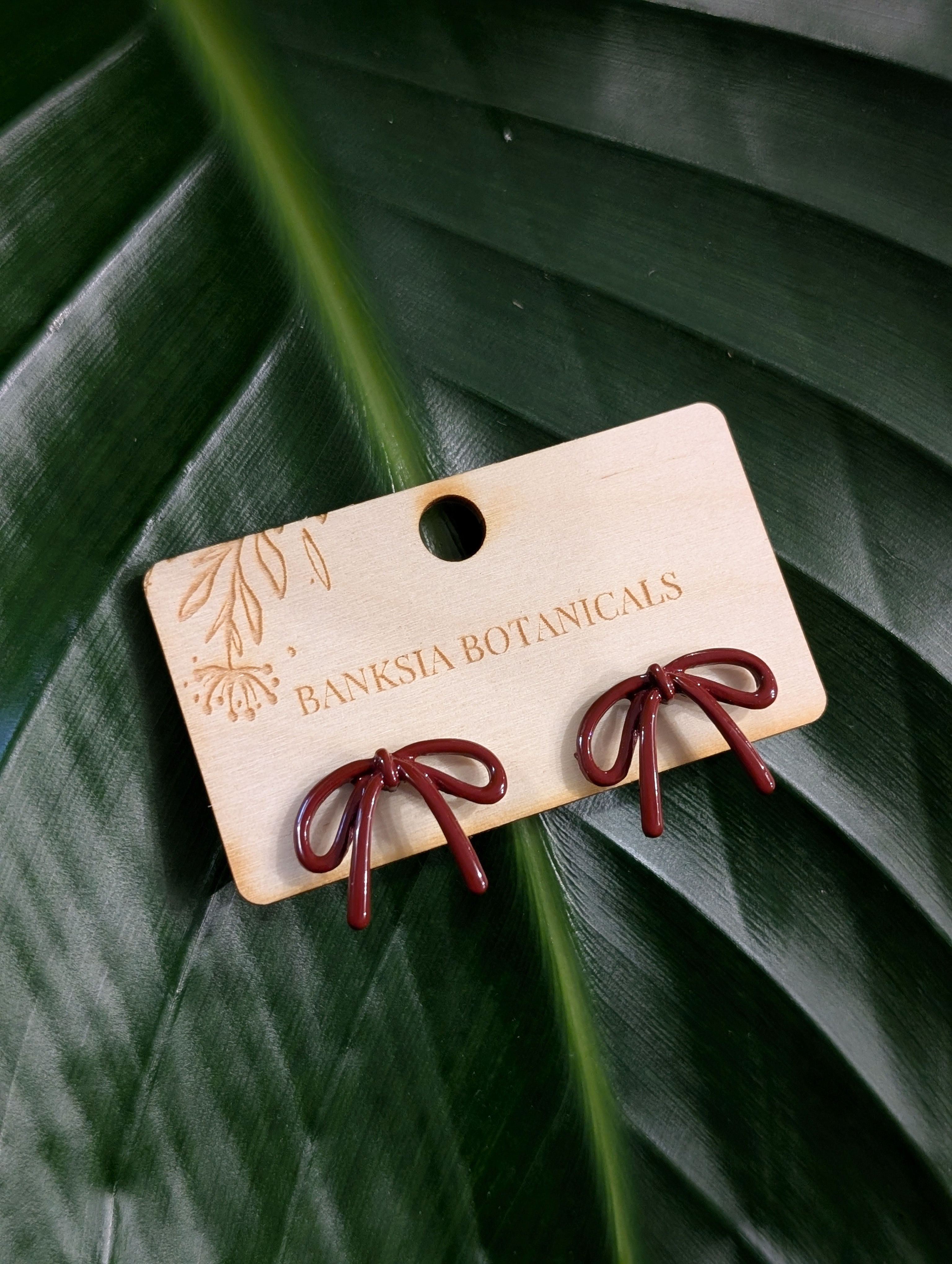 Maroon Bow Statement Earrings 