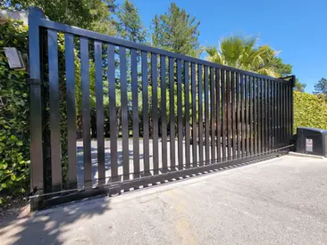 Automatic sliding metal driveway gate