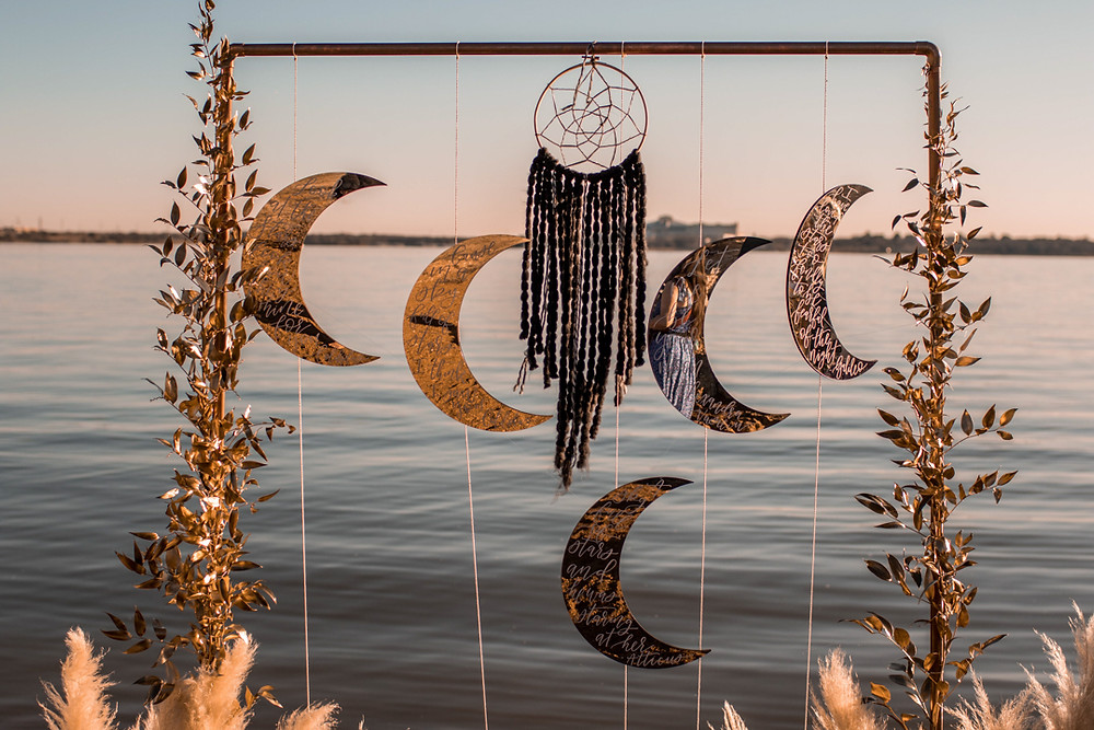 a ceremony arch for a celestial themed texas lakeside elopement