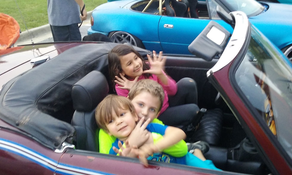 Charli, Liam, Theo in Spitfire Upgrades Triumph Spitfire.jpg