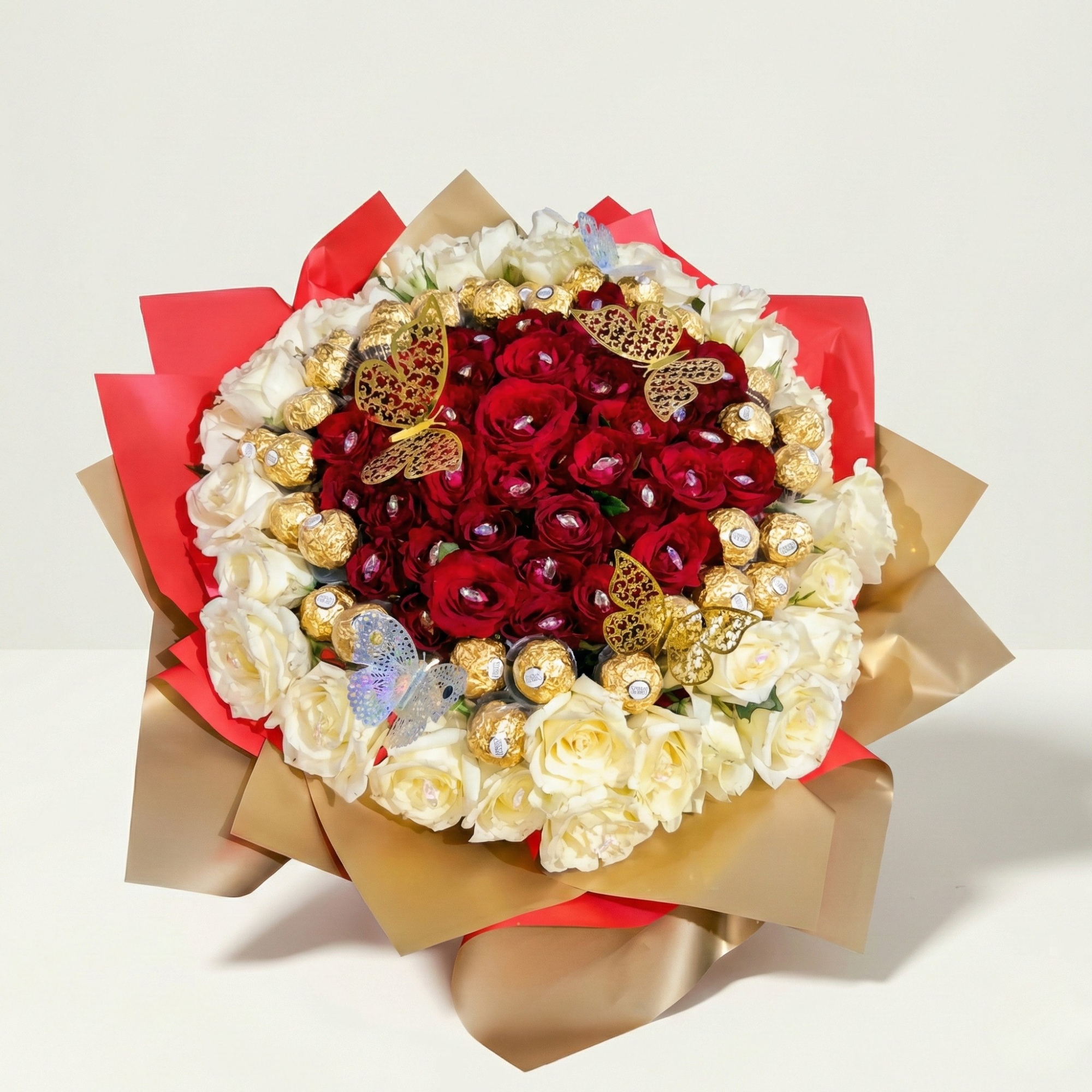 Massive bouquet of 80 red and white roses with 36 Ferrero Rochers and butterflies.