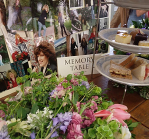 Funeral memory table and afternoon tea with flowers