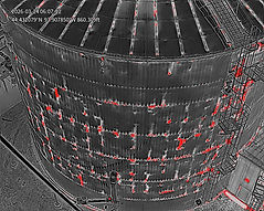 Thermal drone inspection of an industrial storage tank showing heat anomalies and hotspots detected using infrared imaging in Minnesota