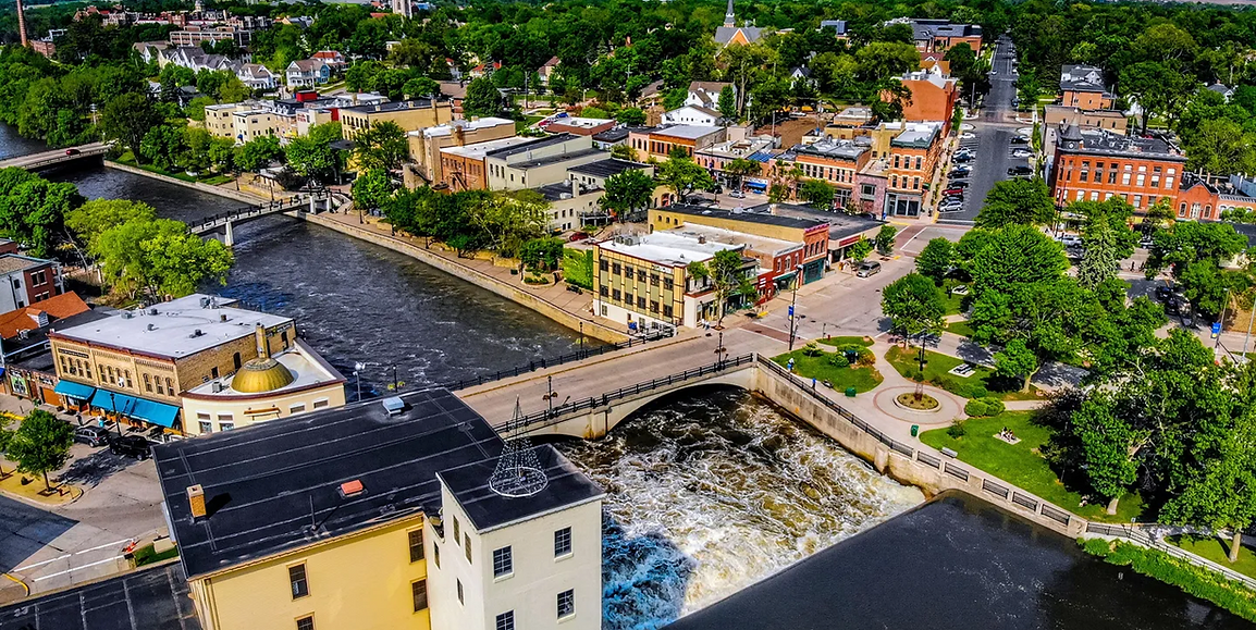 Aerial drone view of downtown Northfield, Minnesota, along the Cannon River