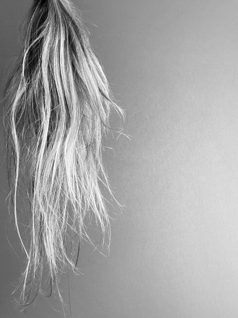 black and white self portrait featuring hair