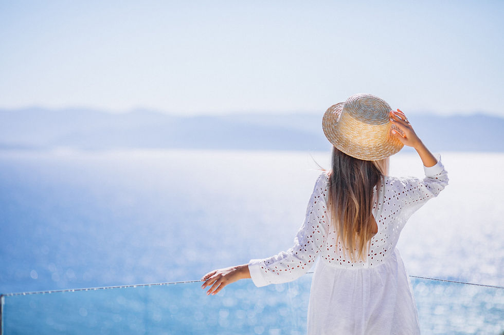 young-woman-standing-from-back-looking-sea.jpg