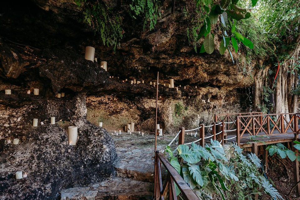 Scenic view of a cenote surrounded by lush jungle used as a destination wedding venue in Mexico