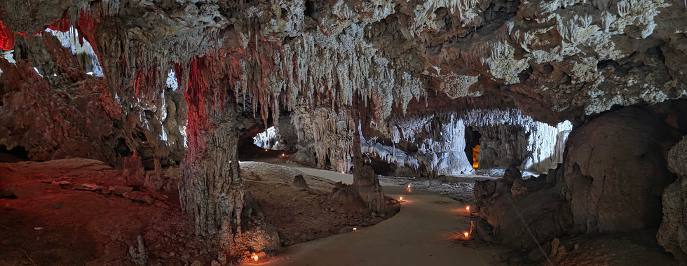 Ambient-lit cenote cave in Tulum designed for private spiritual wedding event
