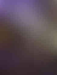 Spiritual guide leading group meditation ceremony inside illuminated cenote cave in Mexico