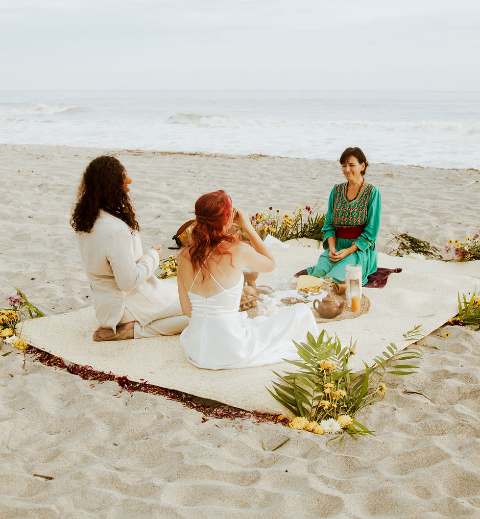 Couple exchanging vows during a personalized symbolic wedding ceremony in an intimate and spiritual atmosphere.
