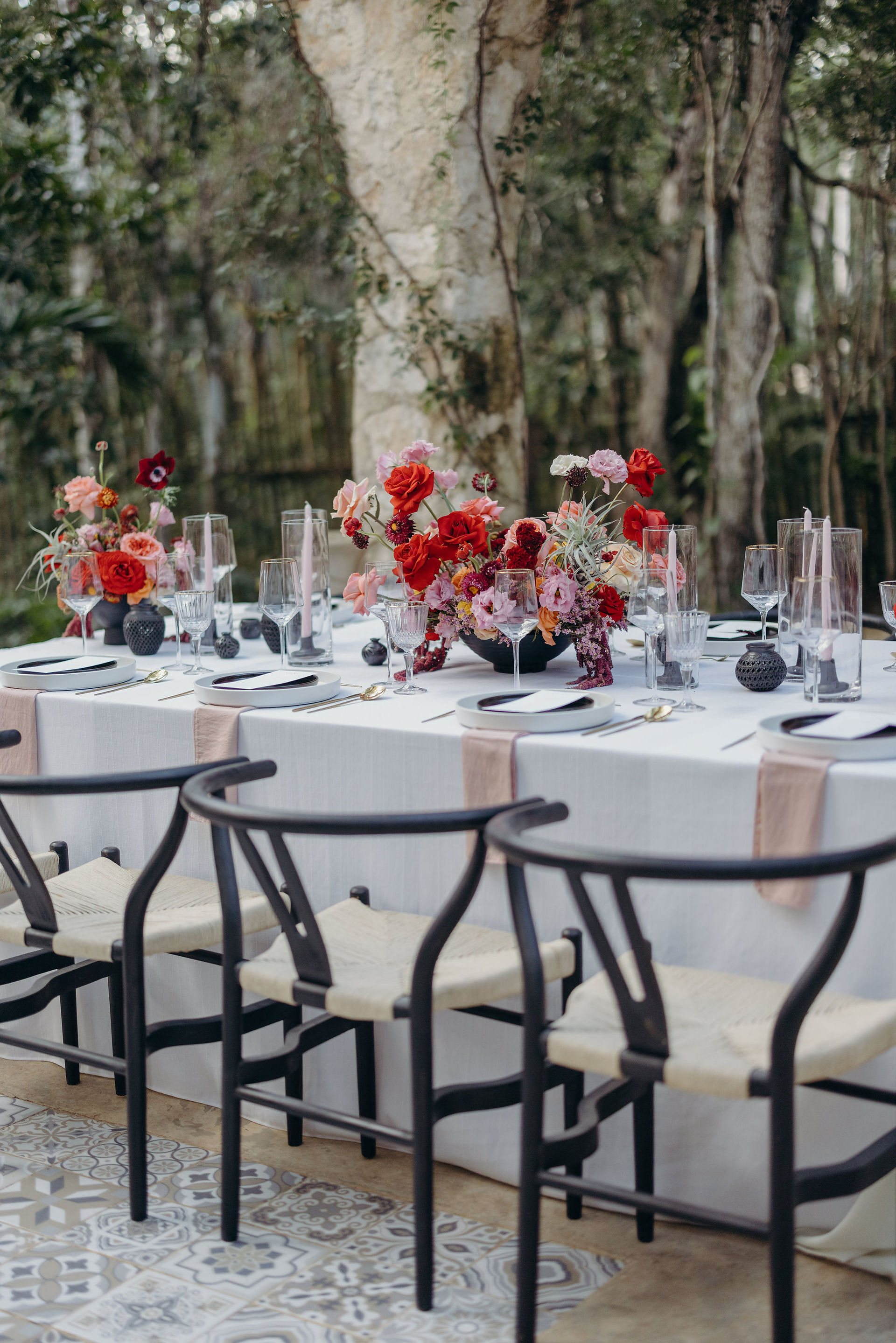 Elegant jungle reception table design for spiritual destination wedding in Tulum
